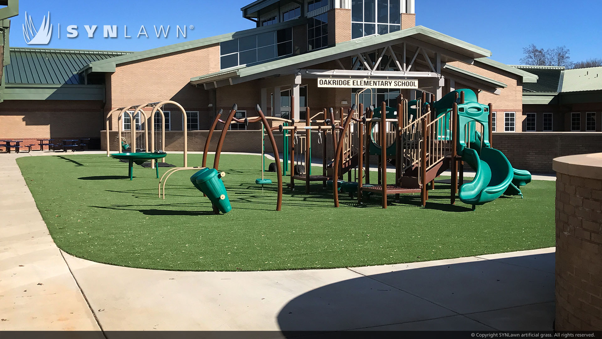 Commercial artificial playground grass installed at elementary school
