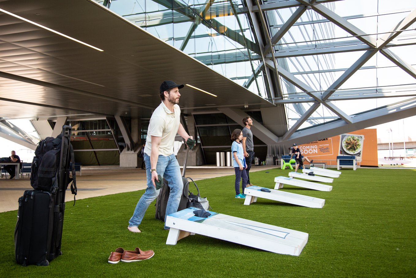 People playing on artificial grass from SYNLawn