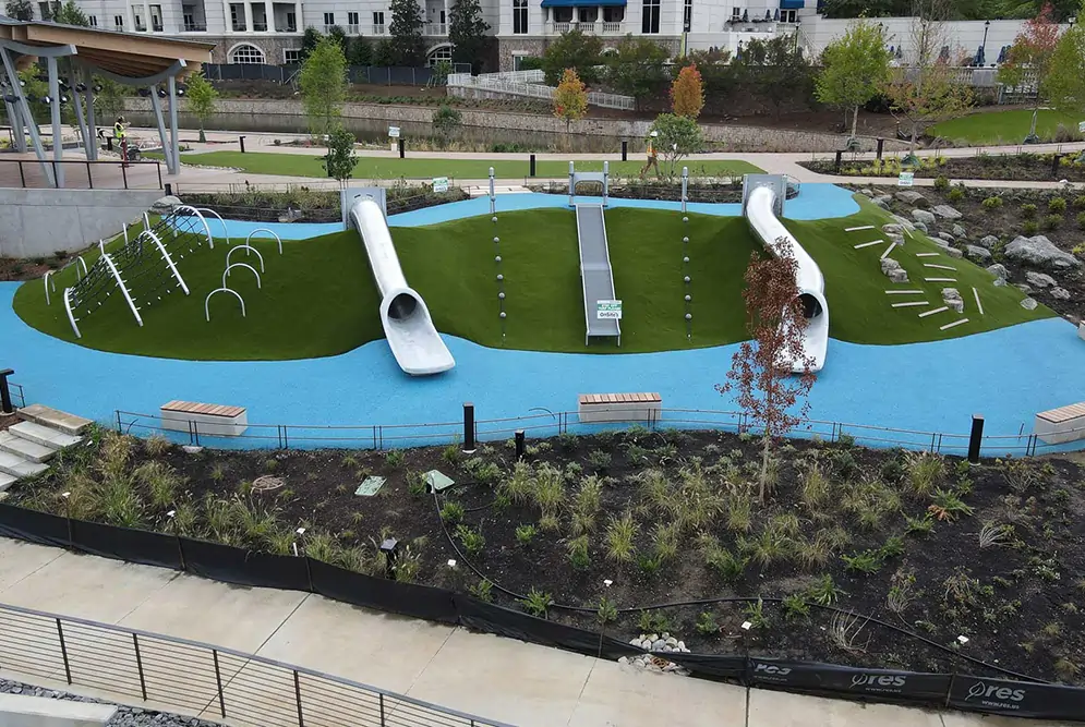 Blue artificial grass playground area