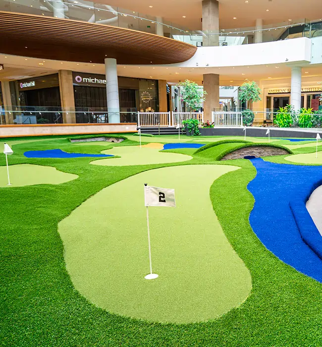Indoor putting green at shopping mall