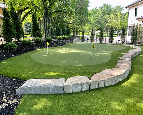 Residential backyard golf green installed by SYNLawn