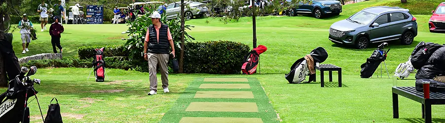 Golfers on artificial driving range grass from SYNLawn
