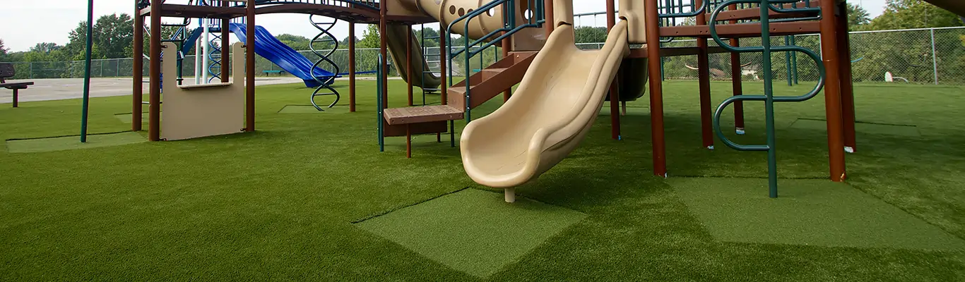 Artificial playground grass installation from SYNLawn